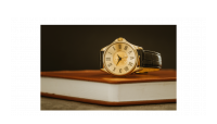 Náramkové hodinky se vsazenou zlatou mincí American Gold Eagle