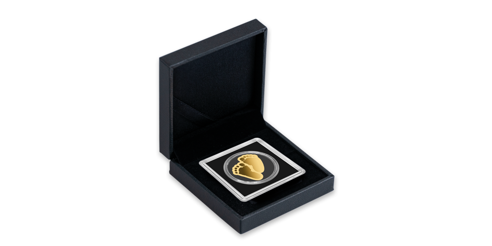 Mince z ryzího zlata ve tvaru dětských nožiček