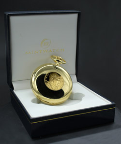 Kapesní hodinky se zlatou mincí T. G. Masaryk