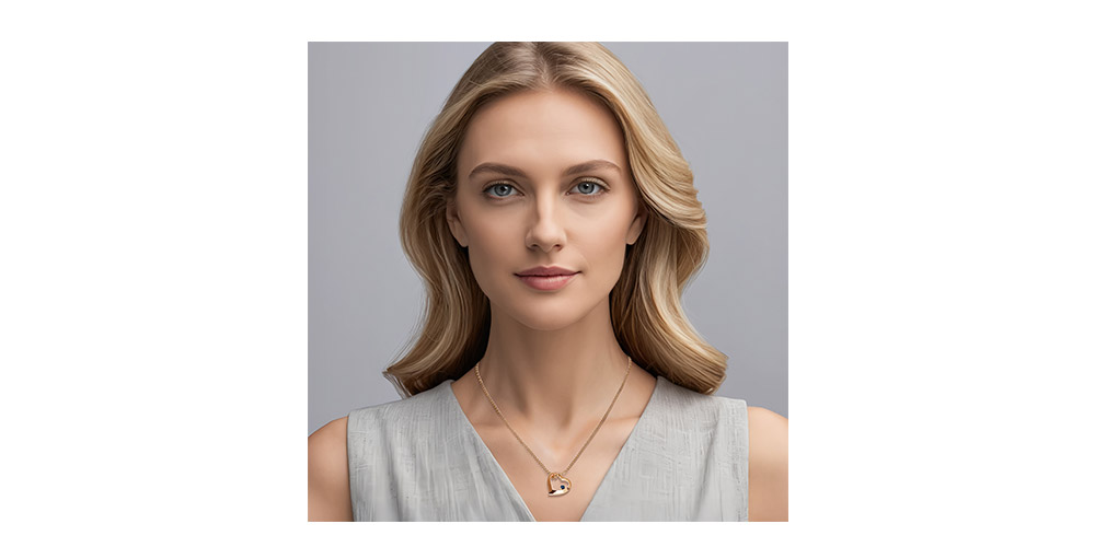 Přívěsek ve tvaru srdce se safírem a zušlechtěný zlatem