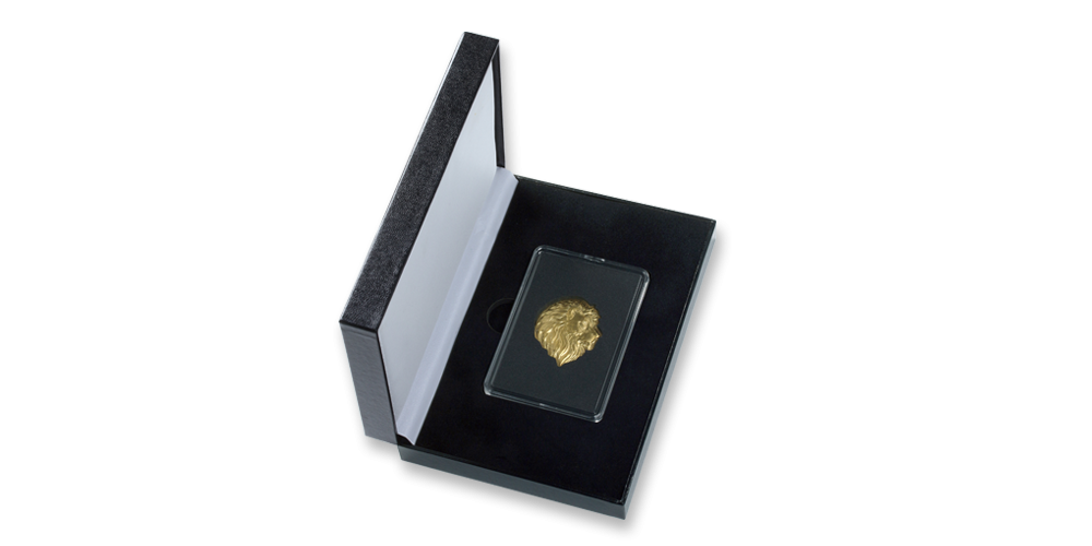Symbol české historie v podobě lva na zlaté minci 